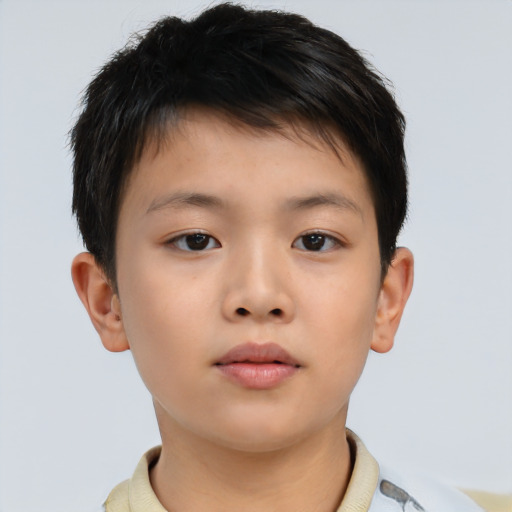 Neutral asian child male with short  brown hair and brown eyes
