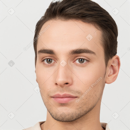 Neutral white young-adult male with short  brown hair and brown eyes