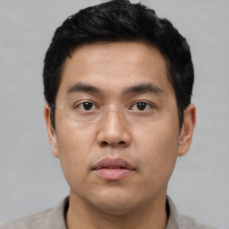 Neutral asian young-adult male with short  black hair and brown eyes