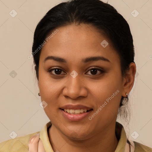 Joyful latino young-adult female with short  brown hair and brown eyes