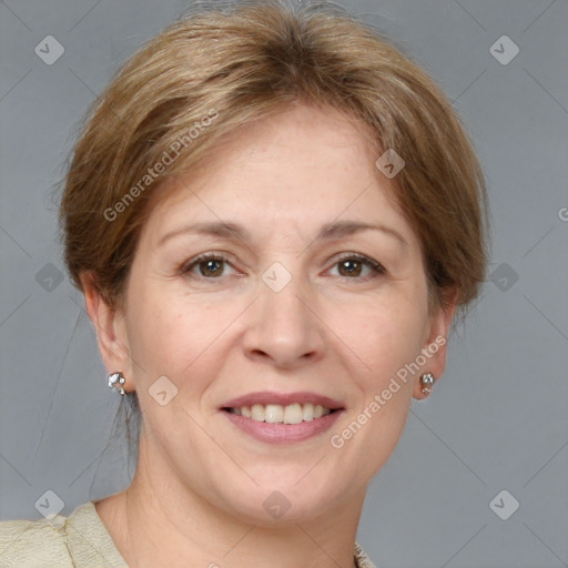 Joyful white adult female with short  brown hair and grey eyes