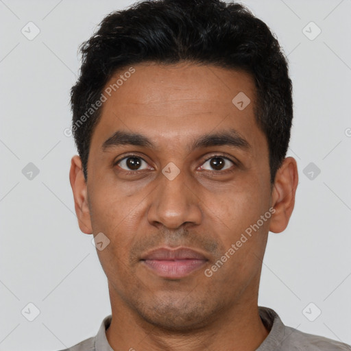 Neutral latino young-adult male with short  black hair and brown eyes