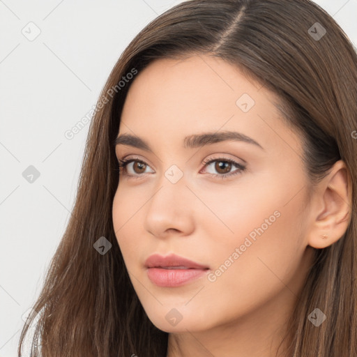 Neutral white young-adult female with long  brown hair and brown eyes