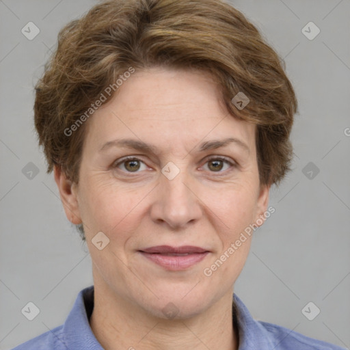 Joyful white adult female with short  brown hair and grey eyes