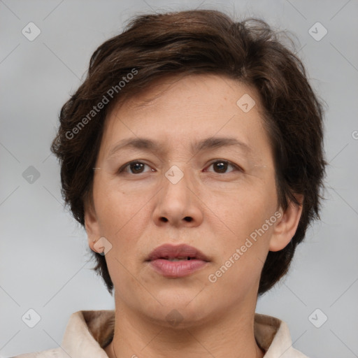 Joyful white adult female with medium  brown hair and brown eyes