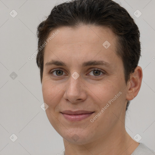 Joyful white young-adult female with short  brown hair and brown eyes