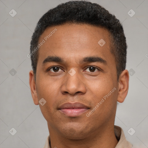 Joyful latino young-adult male with short  brown hair and brown eyes