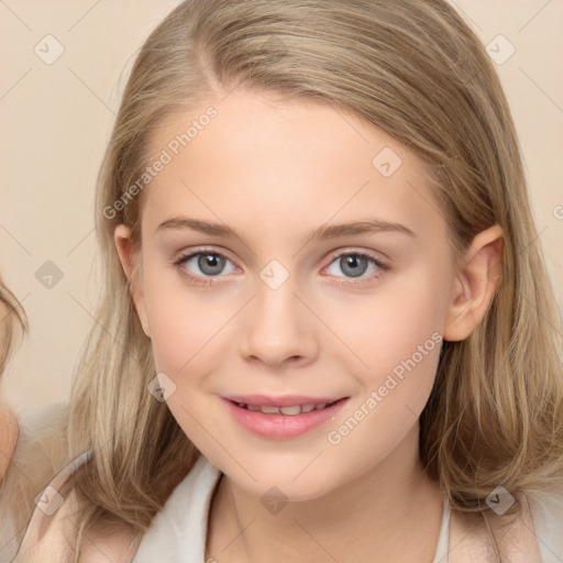 Joyful white child female with long  brown hair and brown eyes