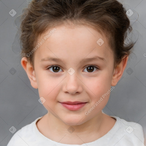 Joyful white child female with short  brown hair and brown eyes