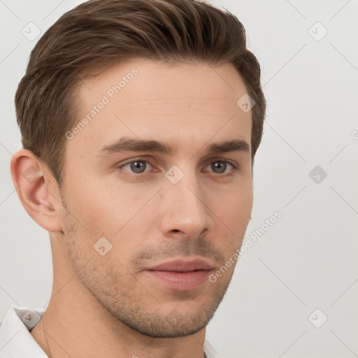 Neutral white young-adult male with short  brown hair and brown eyes