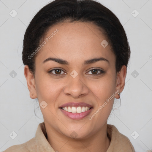 Joyful latino young-adult female with medium  brown hair and brown eyes