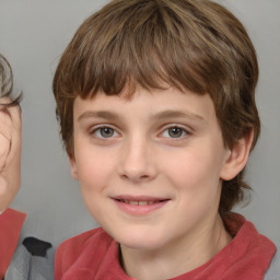 Joyful white child female with medium  brown hair and grey eyes