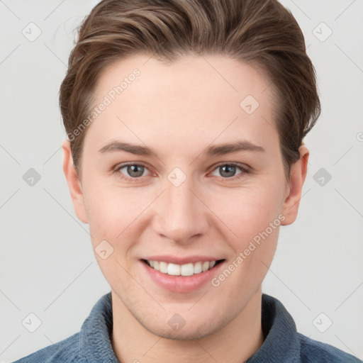 Joyful white young-adult female with short  brown hair and grey eyes