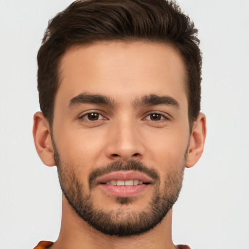 Joyful white young-adult male with short  brown hair and brown eyes