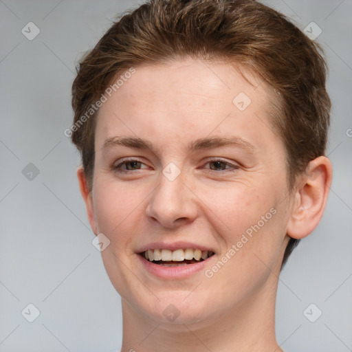 Joyful white young-adult female with short  brown hair and grey eyes