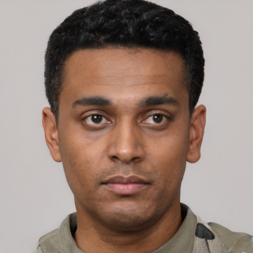 Neutral latino young-adult male with short  black hair and brown eyes