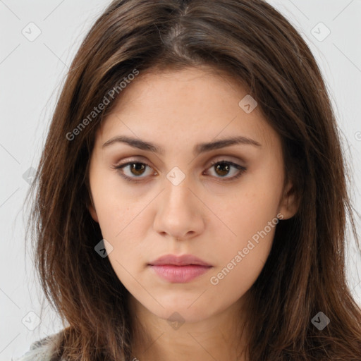 Neutral white young-adult female with long  brown hair and brown eyes