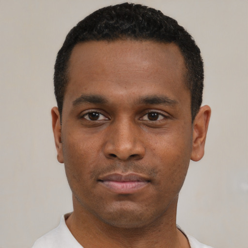 Neutral black young-adult male with short  black hair and brown eyes