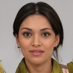 Joyful latino young-adult female with medium  black hair and brown eyes