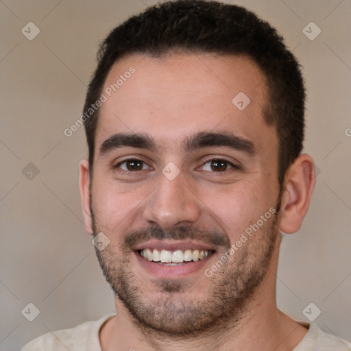 Joyful white young-adult male with short  brown hair and brown eyes