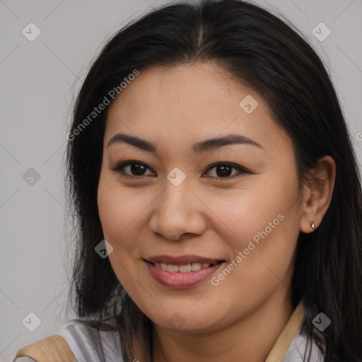 Joyful asian young-adult female with long  brown hair and brown eyes