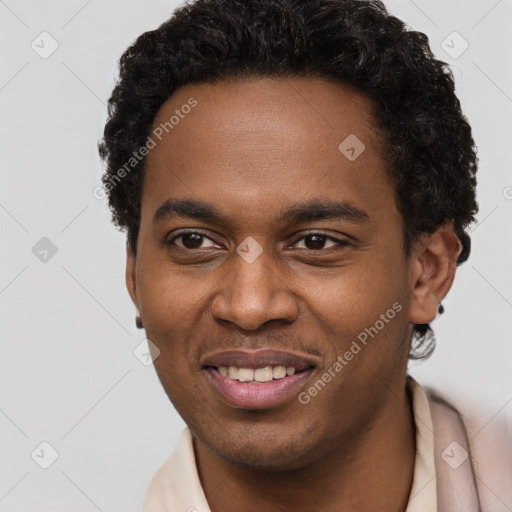 Joyful black young-adult male with short  brown hair and brown eyes