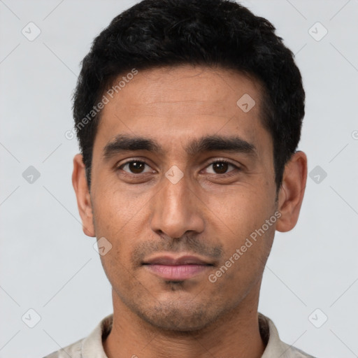 Neutral white young-adult male with short  black hair and brown eyes