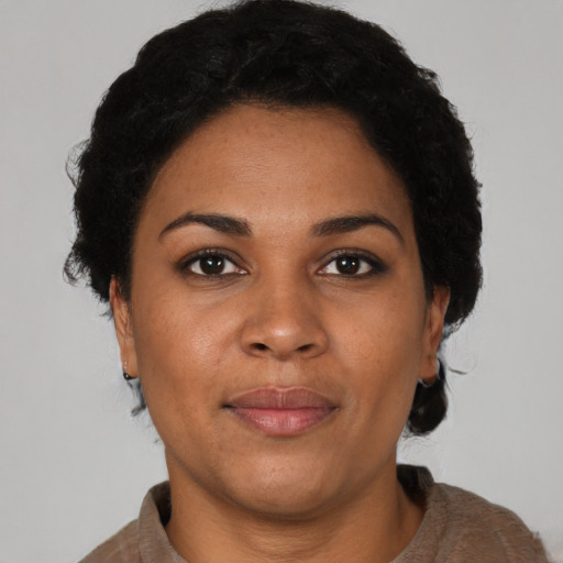 Neutral black young-adult female with short  black hair and brown eyes
