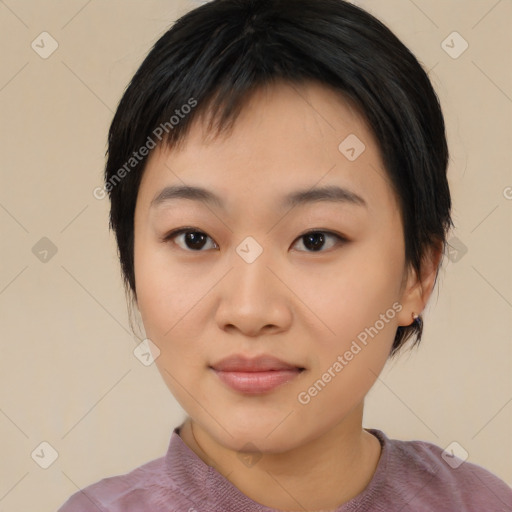 Joyful asian young-adult female with medium  black hair and brown eyes