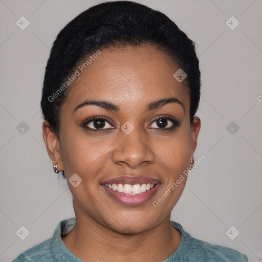 Joyful black young-adult female with short  black hair and brown eyes