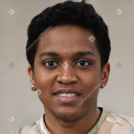 Joyful black young-adult male with short  black hair and brown eyes