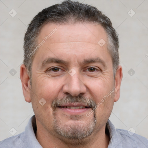 Joyful white middle-aged male with short  brown hair and brown eyes