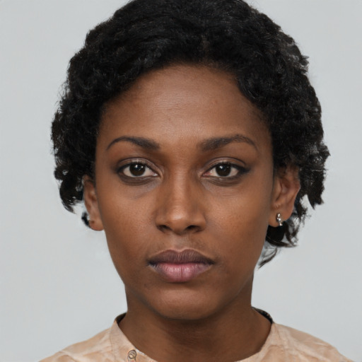 Neutral black young-adult female with short  black hair and brown eyes