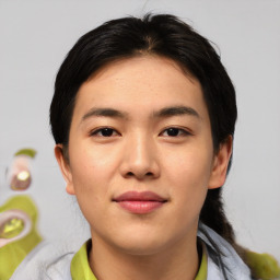 Joyful asian young-adult female with medium  black hair and brown eyes