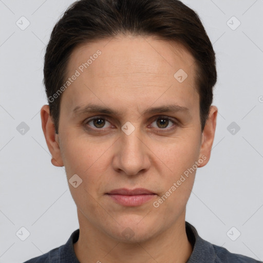 Joyful white adult male with short  brown hair and grey eyes