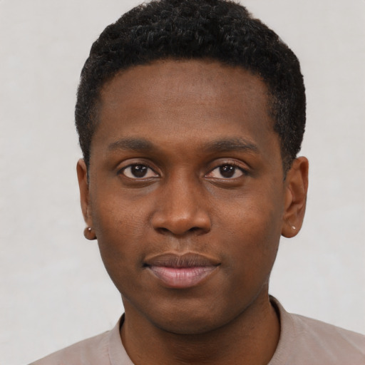 Neutral black young-adult male with short  brown hair and brown eyes