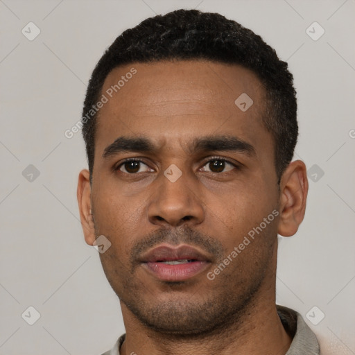 Neutral latino young-adult male with short  black hair and brown eyes