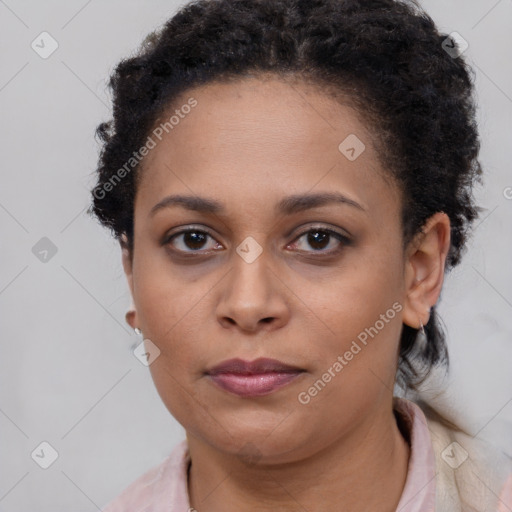 Neutral black young-adult female with short  brown hair and brown eyes