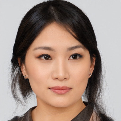 Neutral asian young-adult female with medium  black hair and brown eyes