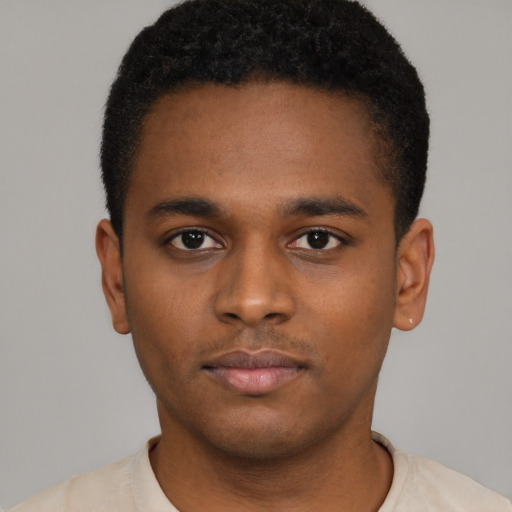 Neutral latino young-adult male with short  brown hair and brown eyes