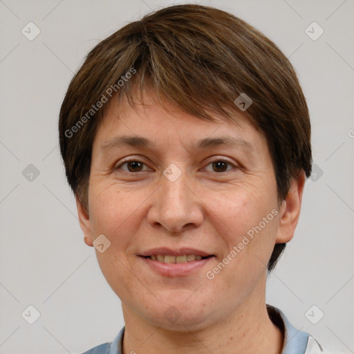 Joyful white adult female with short  brown hair and brown eyes