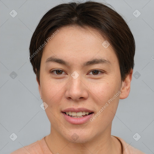 Joyful white young-adult female with short  brown hair and brown eyes