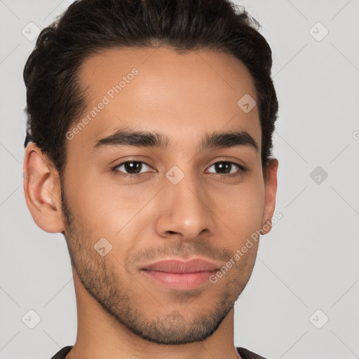 Joyful latino young-adult male with short  brown hair and brown eyes