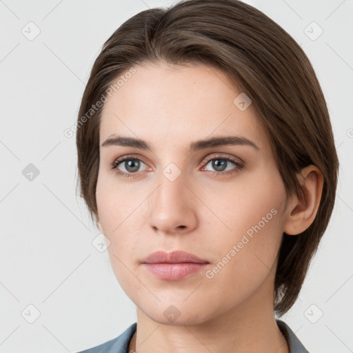 Neutral white young-adult female with medium  brown hair and grey eyes