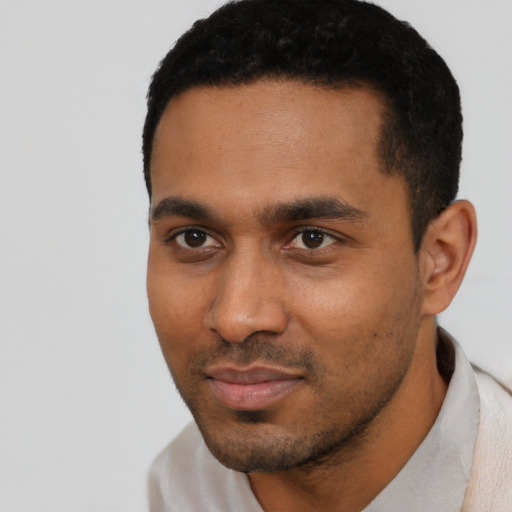 Neutral black young-adult male with short  black hair and brown eyes