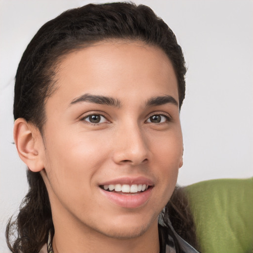 Joyful white young-adult male with medium  brown hair and brown eyes