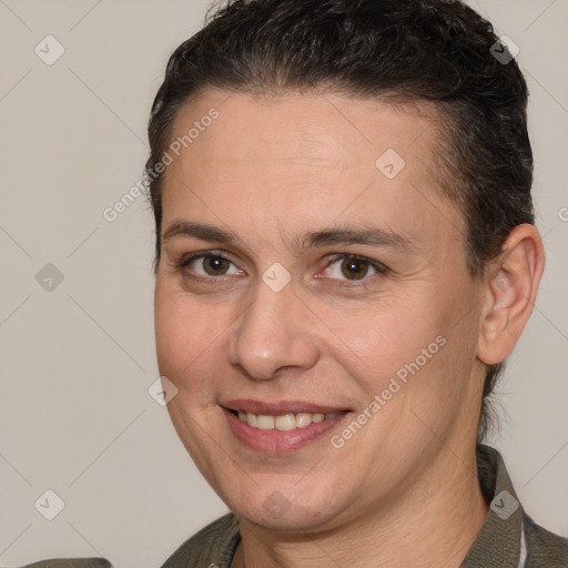 Joyful white adult female with short  brown hair and brown eyes