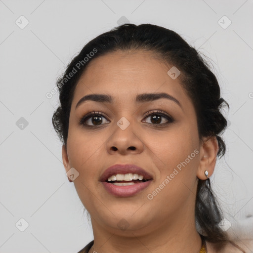 Joyful latino young-adult female with medium  black hair and brown eyes