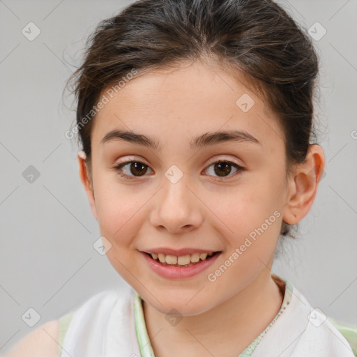 Joyful white child female with short  brown hair and brown eyes