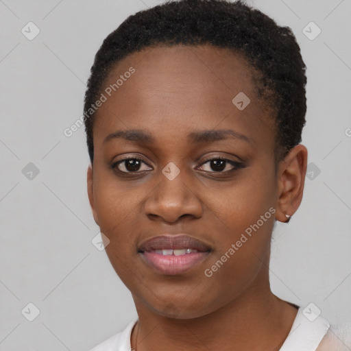 Joyful black young-adult female with short  brown hair and brown eyes